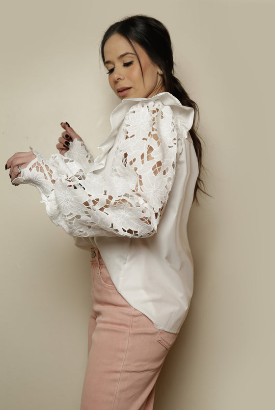Aitana in white blouse