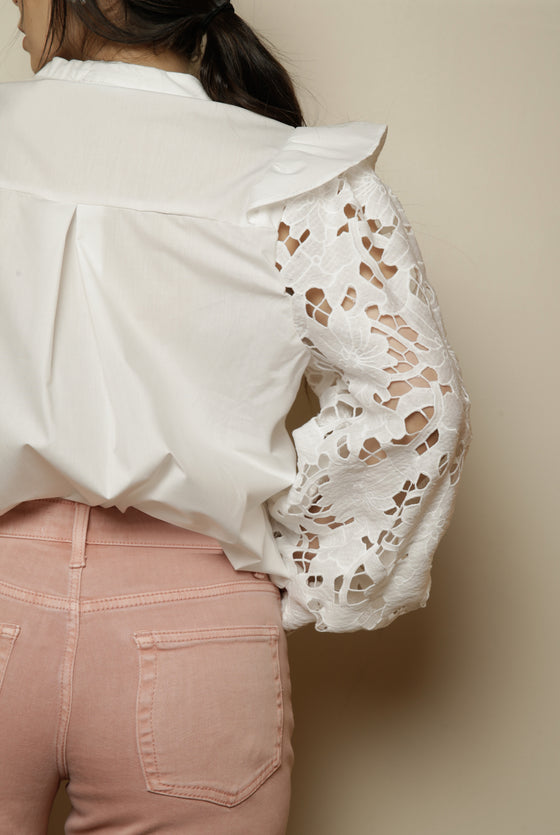 Aitana in white blouse